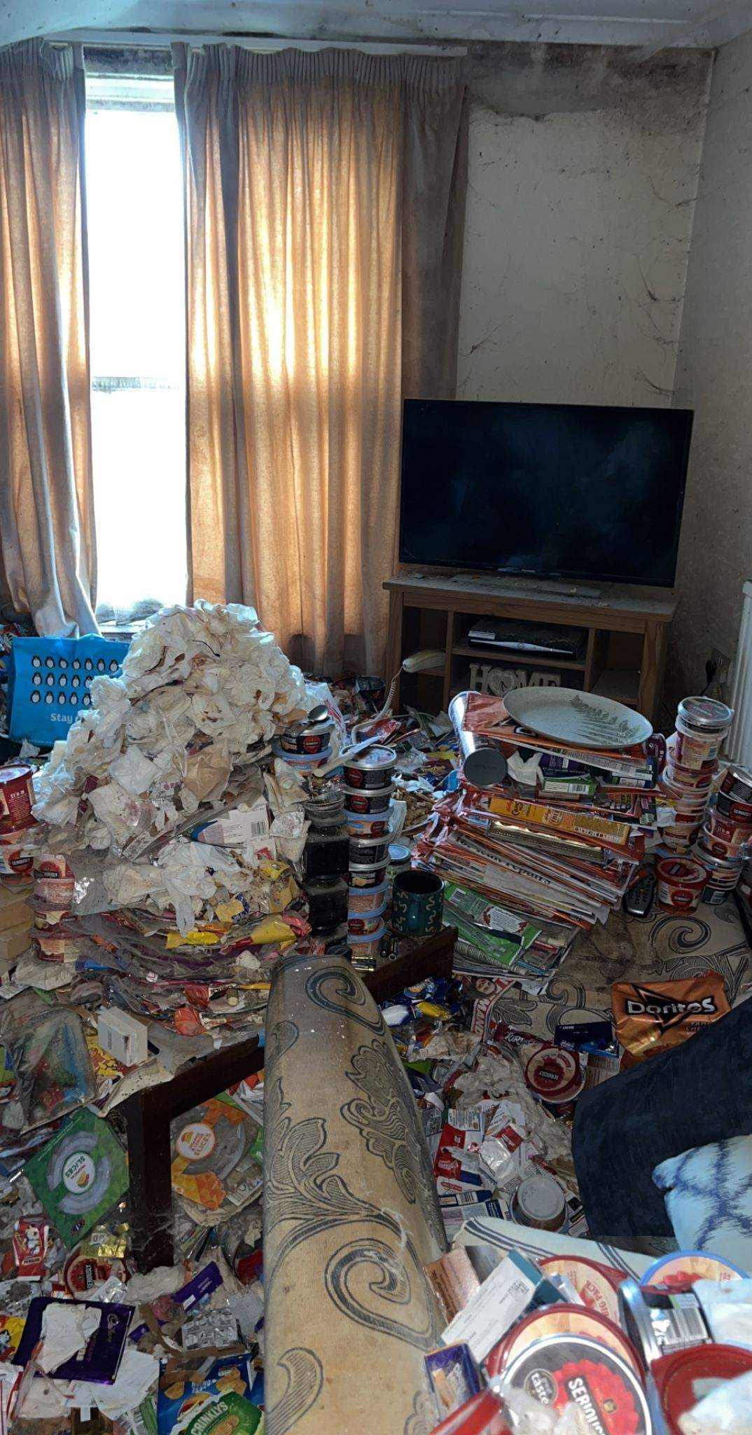 Hoarded home clearance — before