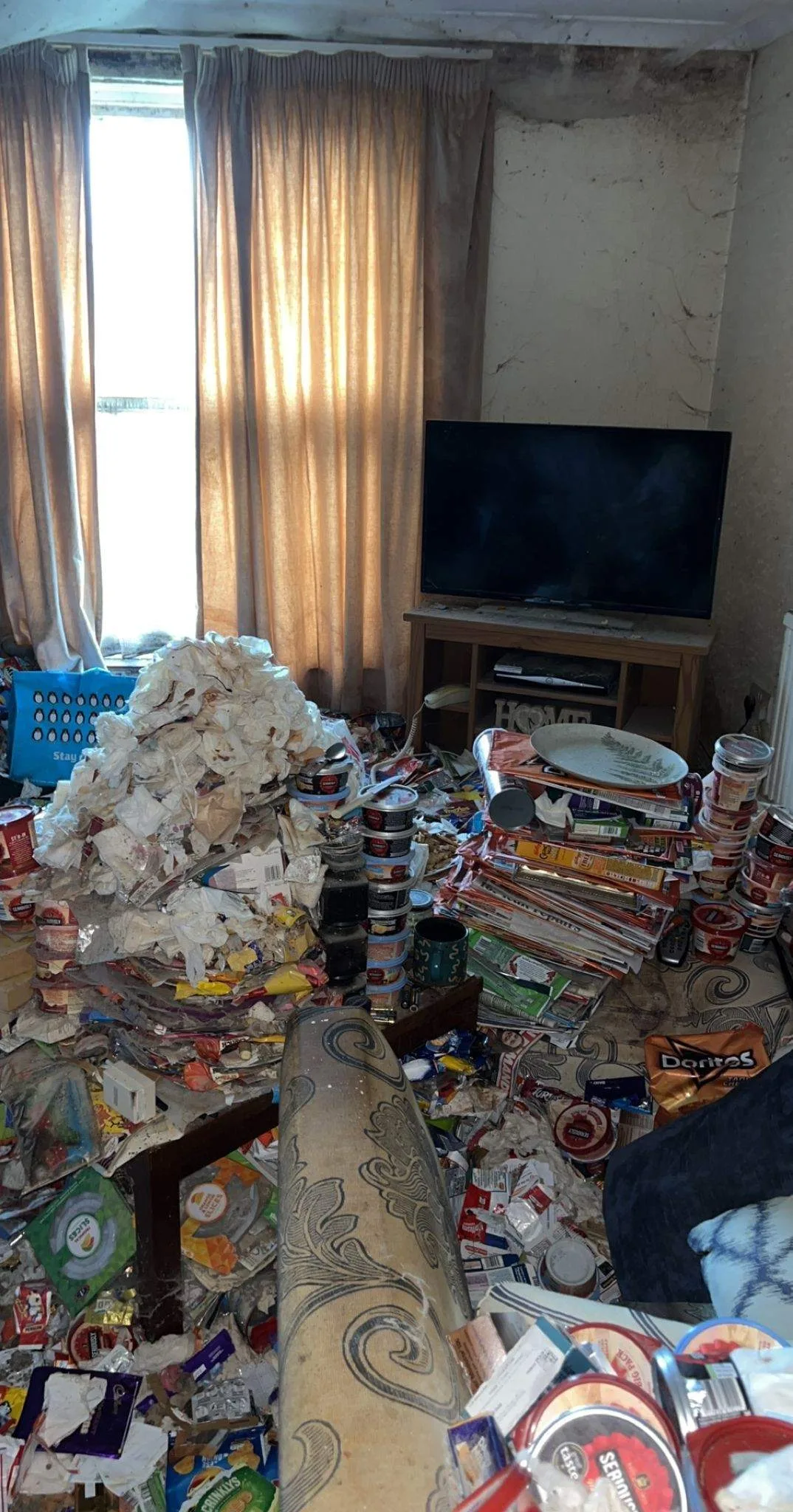 Hoarded home clearance — before