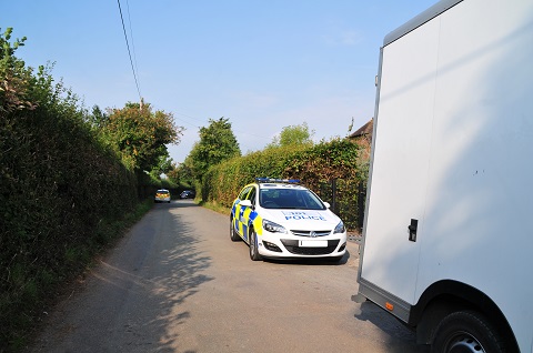 Our van and the police outside the property during the clearance
